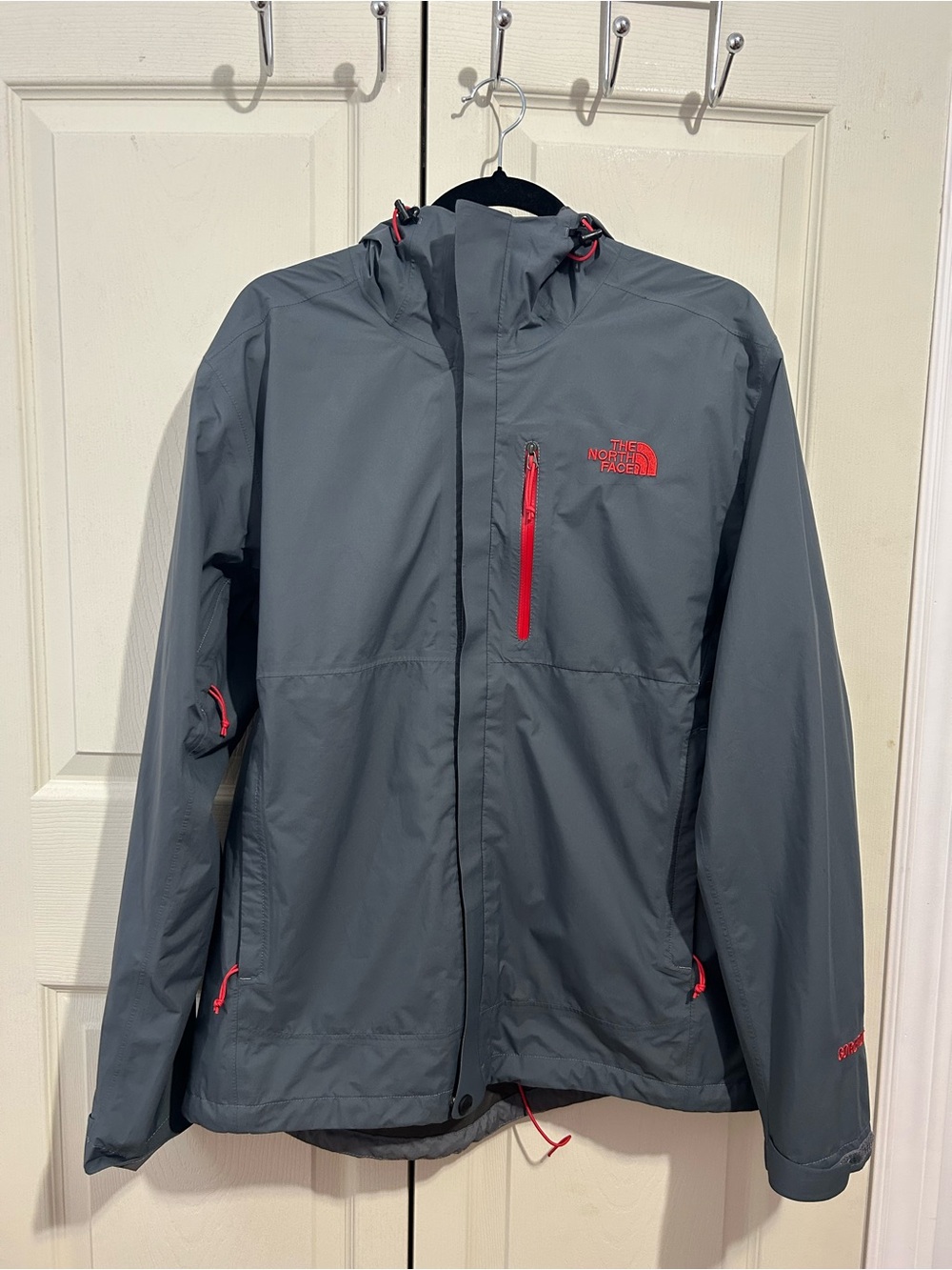 The North Face Gray Rain Jacket with Red Accents